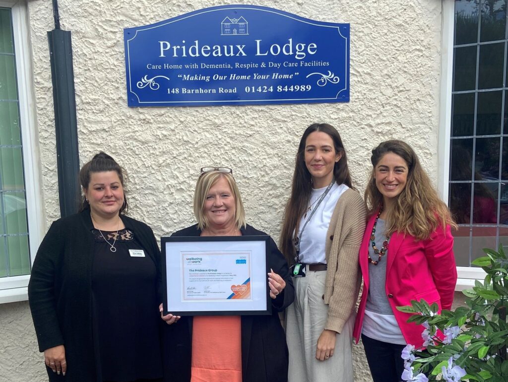 East Sussex Wellbeing at Work’s Commitment award presentation to The Prideaux Group. Left to Right: The Prideaux Group’s Ella Gallop (Registered Manager) and Denise Argent (Operations Director); East Sussex County Council’s Sarah Nash and Flavia de Melo Dewey