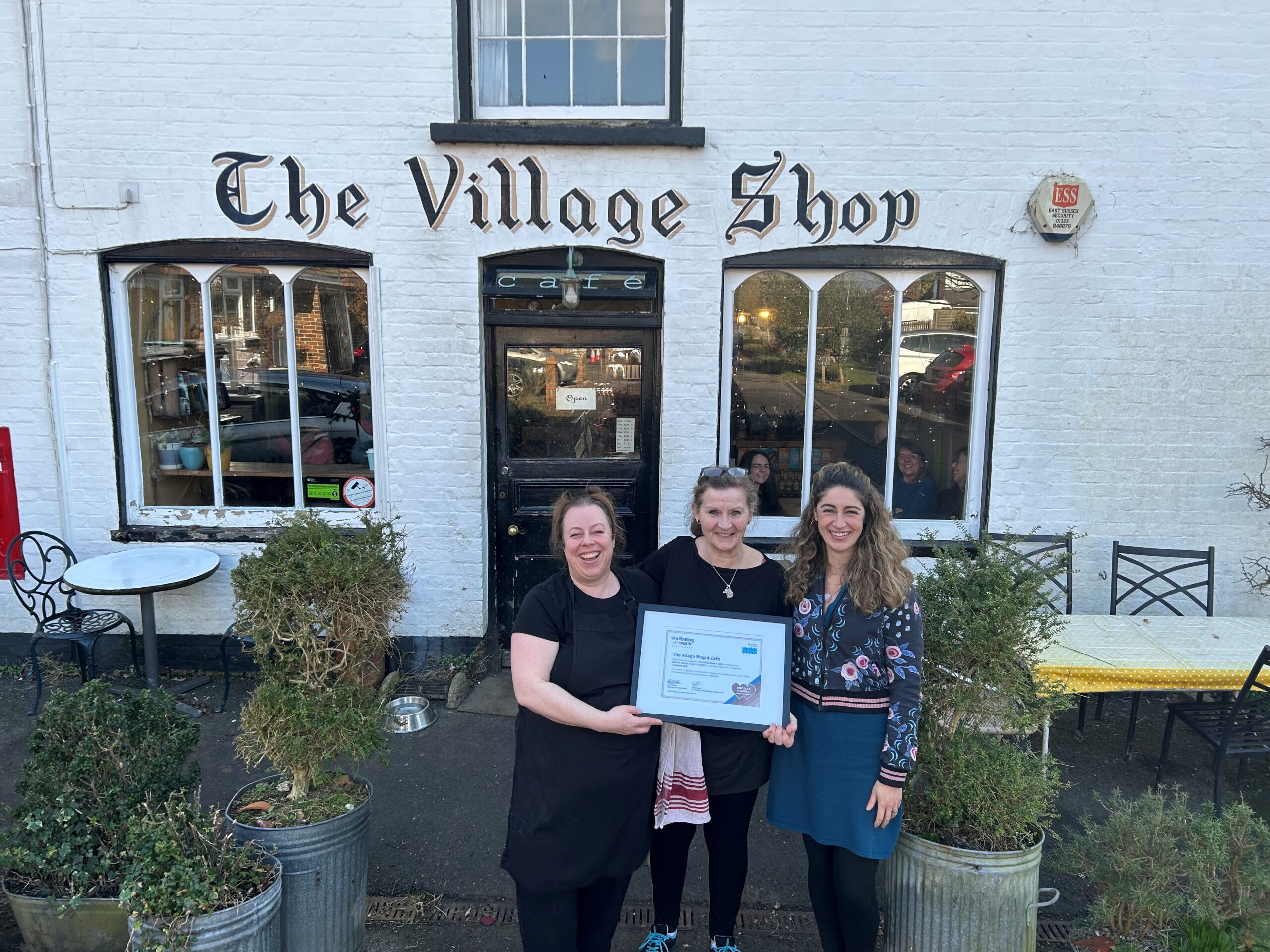 Left to Right: The Village Shop’s Tess Flower (director) and Jo Robinson-Sivyer (manager), and ESCC’s Flavia de Melo Dewey