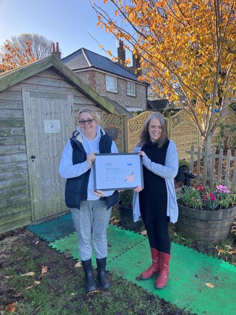 Saffrons Park Nursery Wellbeing Leads with framed certificate of Commitment Award in September 2023