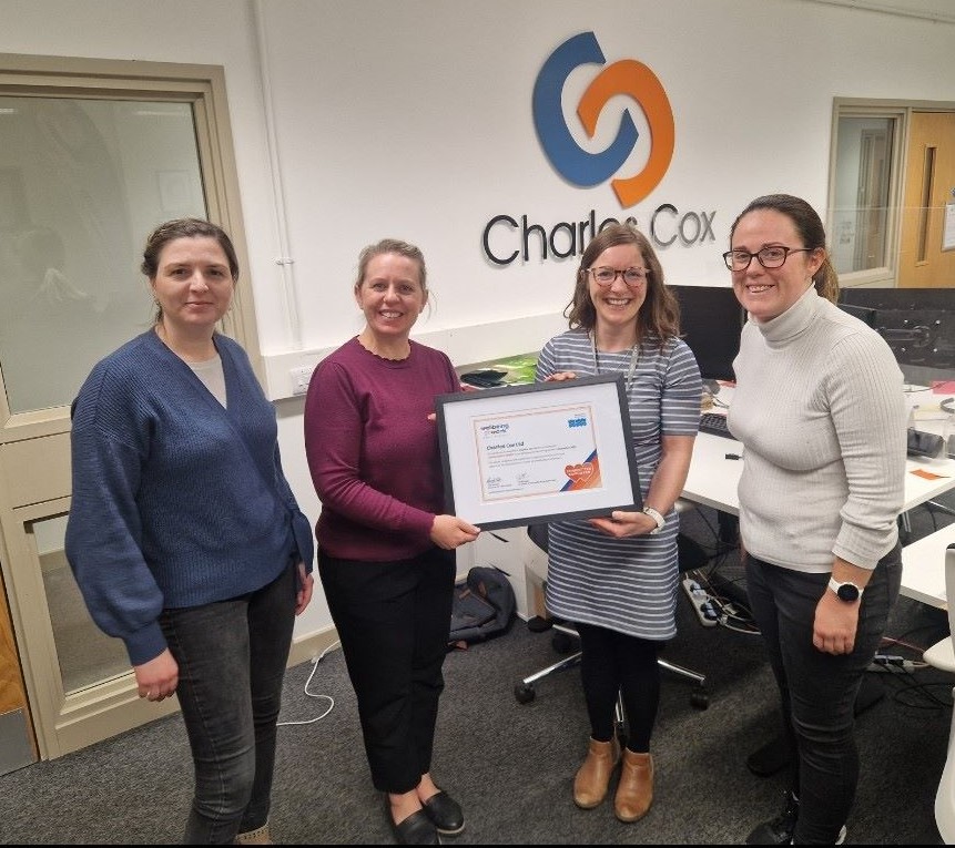 Charles Cox Staff and Wellbeing at Work team with the framed certificate